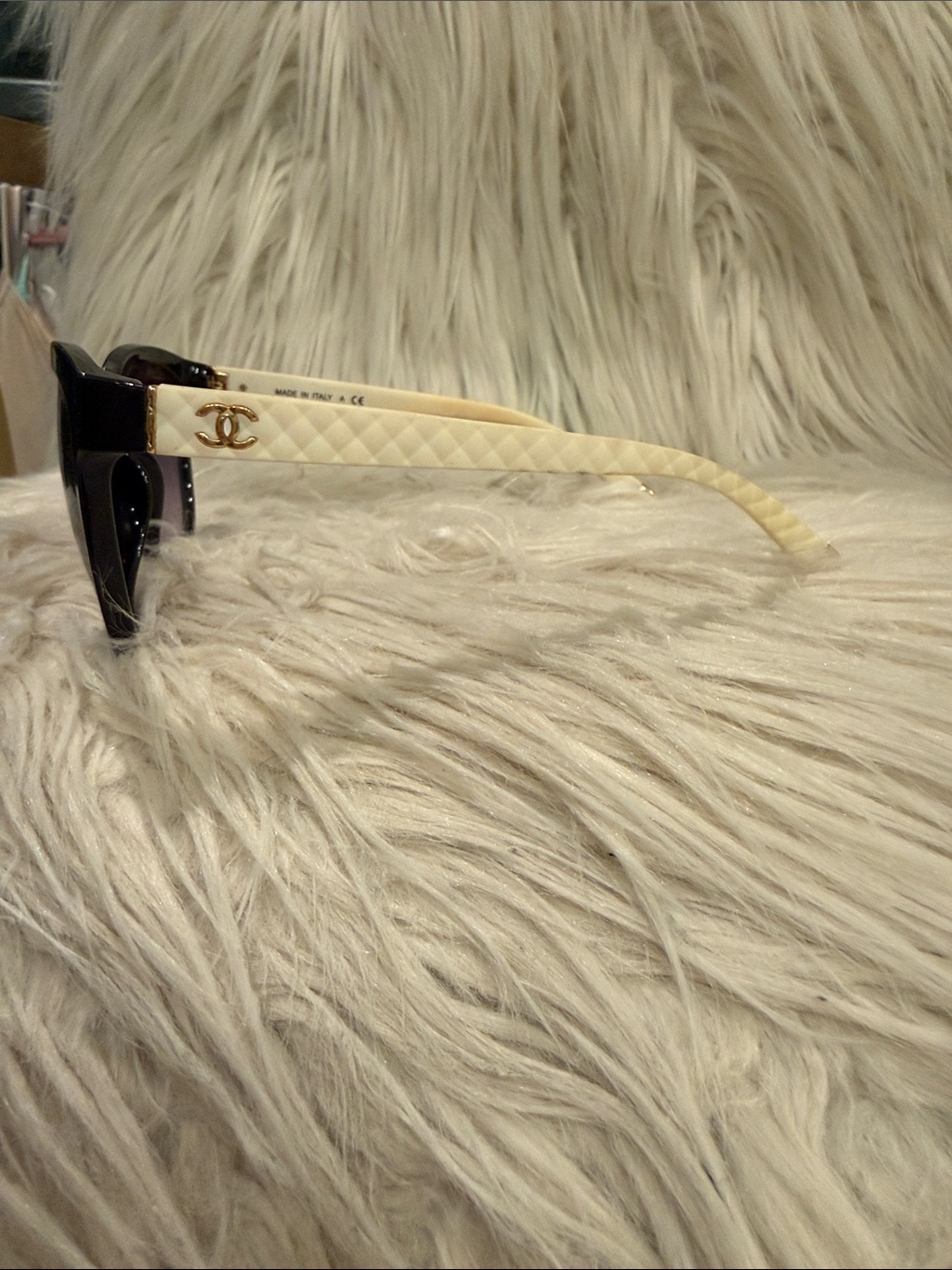 Chanel Black Frame Sunglasses With Cream Quilted Arms And Gold Cc